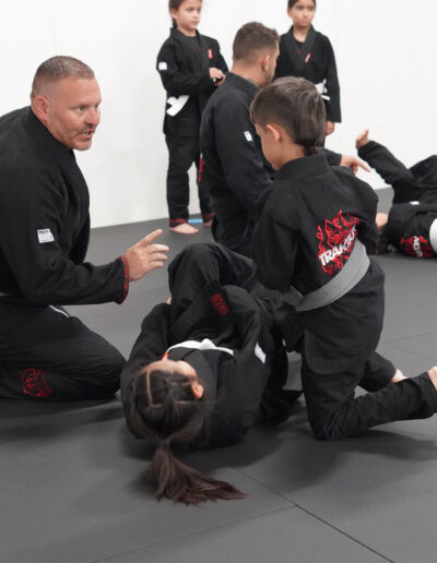 Coach Mike teaching a technique at Traktion Jiu Jitsu Academy